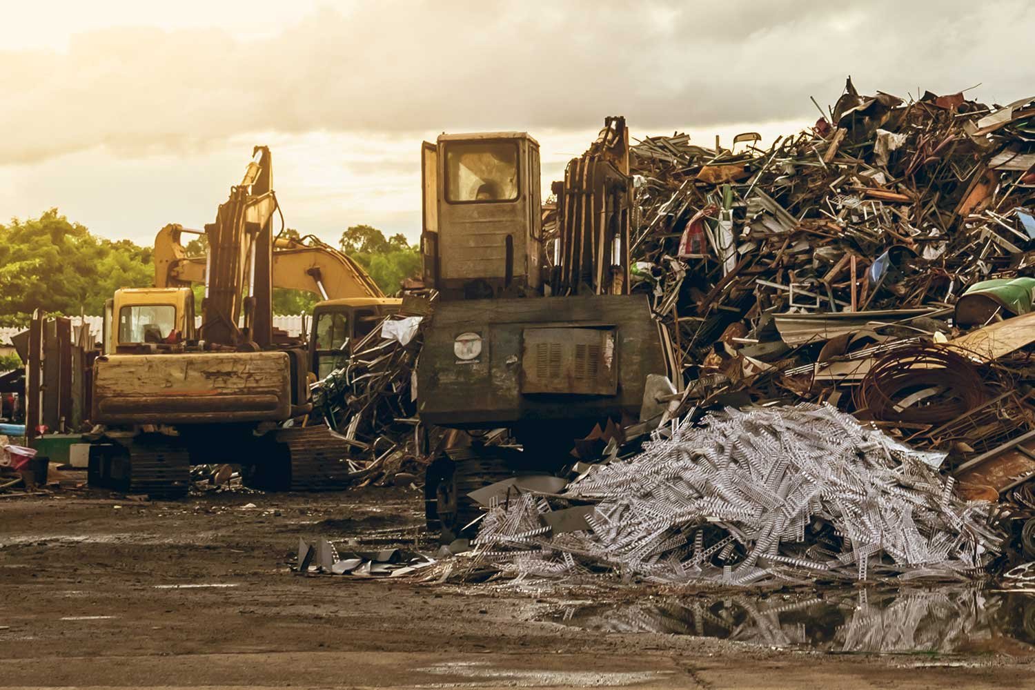 pile of garbage and backhoe at waste depot rubbish xhys36x 1.jpg