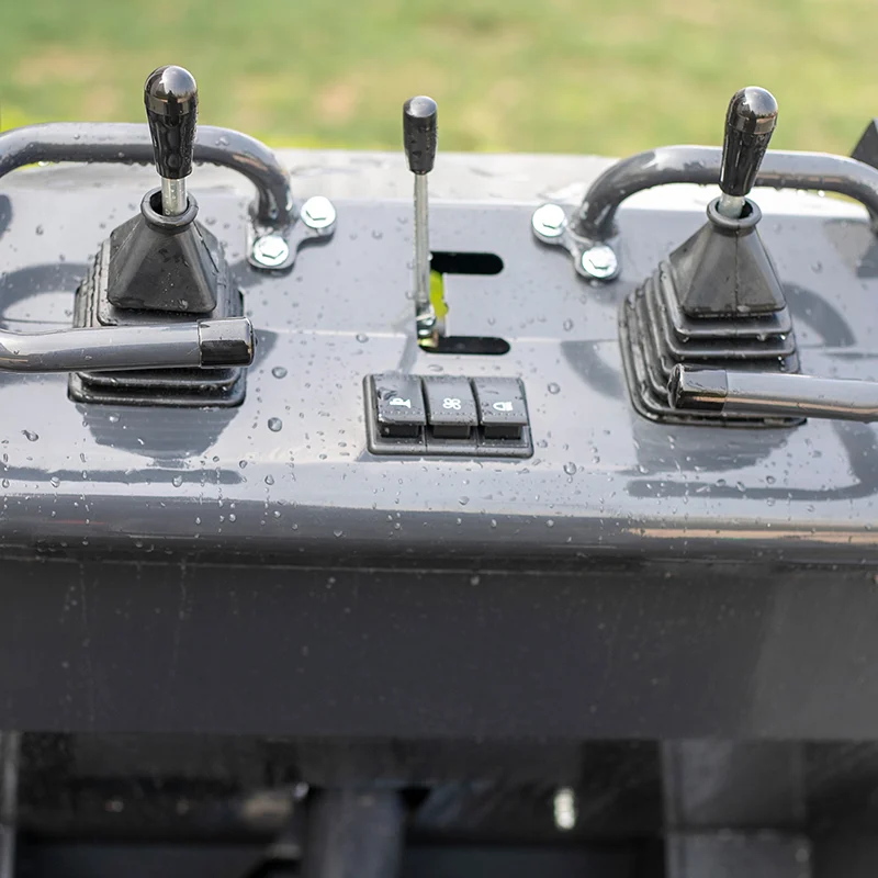 Skid steer loader control panel with two joysticks