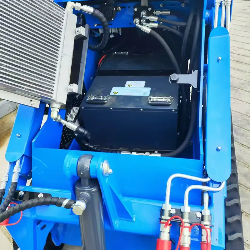 Open radiator compartment during tracked skid steer inspection