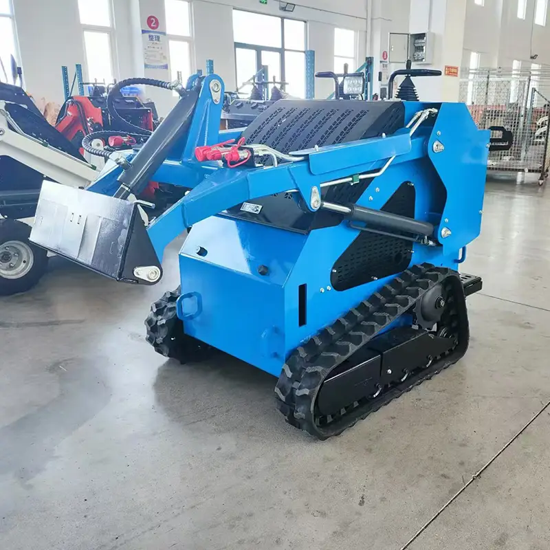 Blue tracked loader in a machinery production workshop