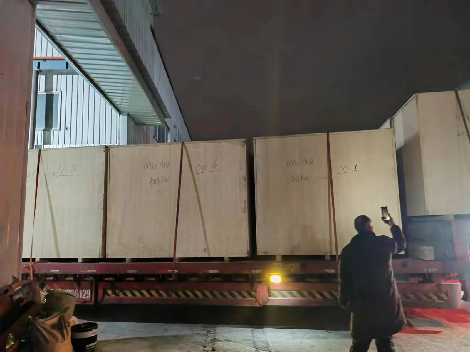 diesel engine shipping wooden crates truck unloading